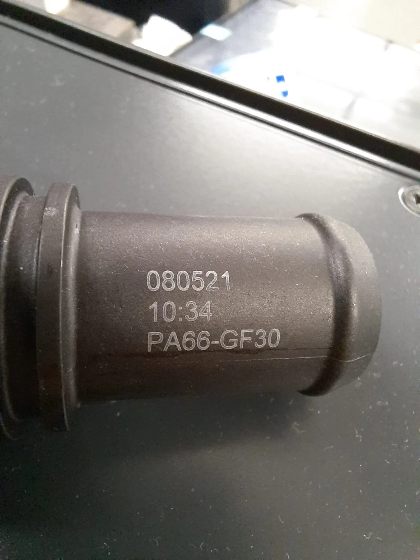 Alphanumeric laser marking on an industrial plastic component