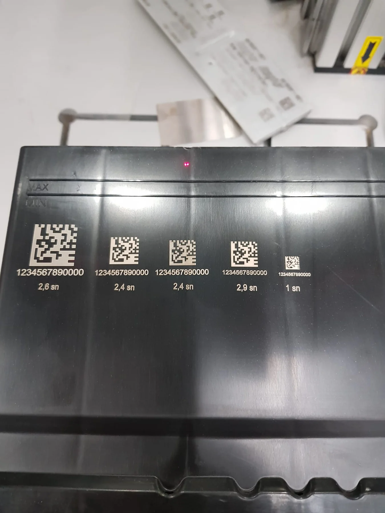 Data Matrix laser marking size tests on black plastic